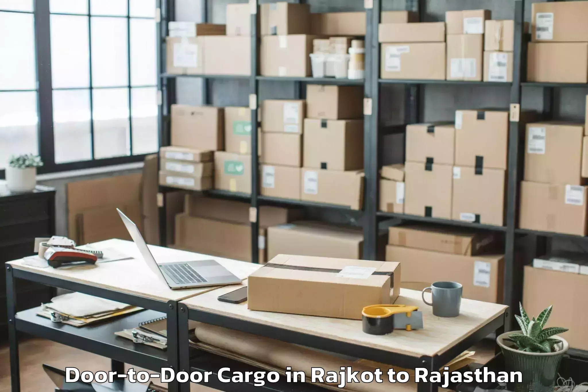 Top Rajkot to Pratap University Jaipur Door To Door Cargo Available